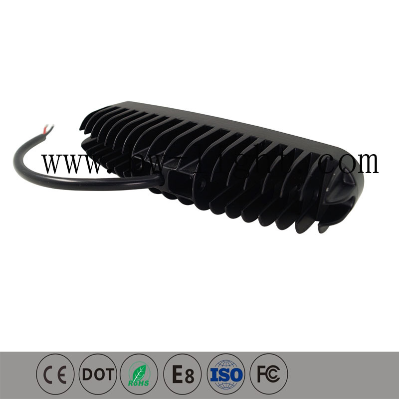Industrial waterproof LED work light undergoing severe testing conditions